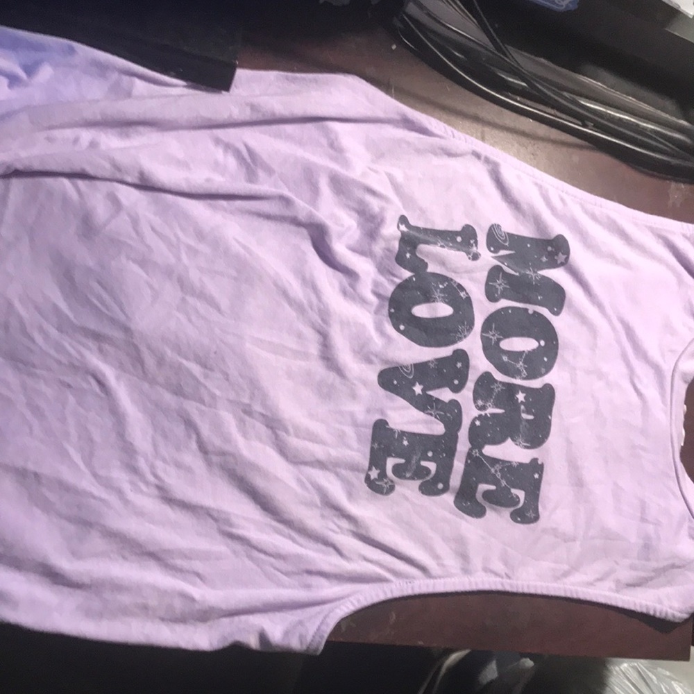 Really cute purple tank top. L 11-13, with a cute back with strings